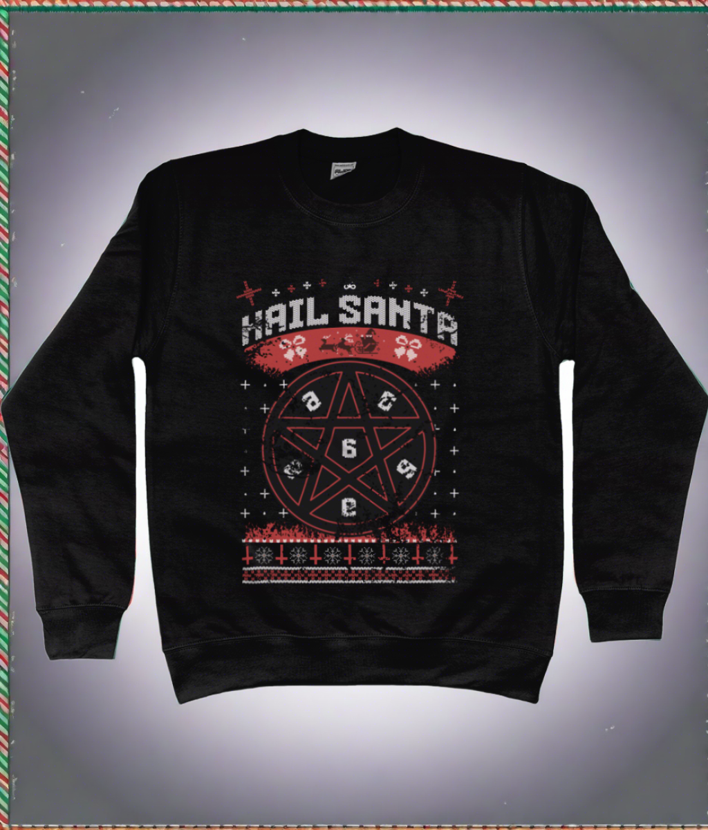 A black Christmas jumper with the playful phrase "Hail Santa" emblazoned across the top in bold, festive lettering. At the centre is a striking red pentacle surrounded by seasonal icons such as reindeer, fir trees, and snowflakes, infusing traditional holiday imagery with a cheeky sense of humour.