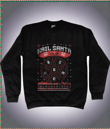 A black Christmas jumper with the playful phrase "Hail Santa" emblazoned across the top in bold, festive lettering. At the centre is a striking red pentacle surrounded by seasonal icons such as reindeer, fir trees, and snowflakes, infusing traditional holiday imagery with a cheeky sense of humour.