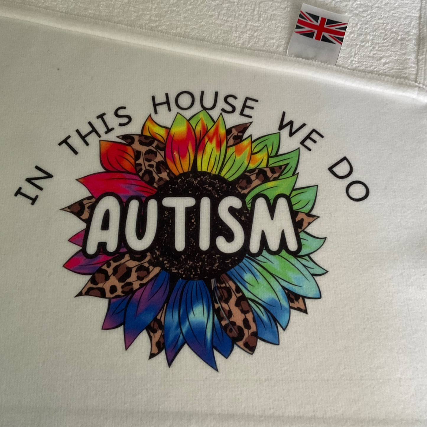 In this house we do autism tea towel
