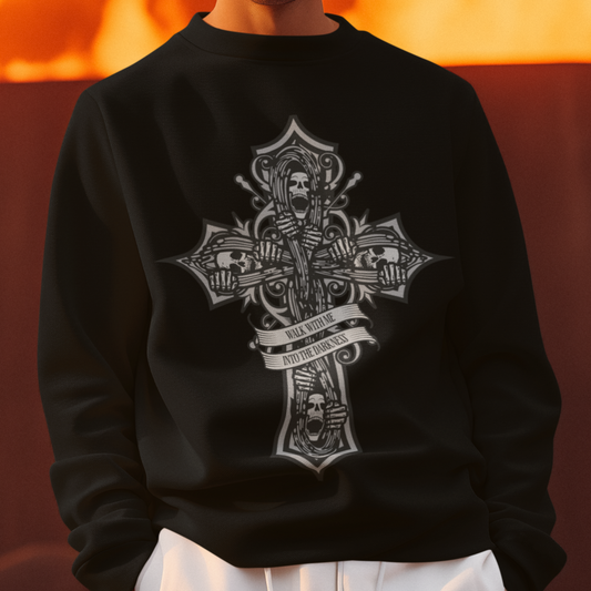 A black sweatshirt with a central graphic featuring a detailed Grim Reaper illustration set against a cross backdrop. Above and below the design, the phrase "Walk With Me Into The Darkness" is written in a gothic font style. The sweatshirt has a ribbed collar, cuffs, and hem for a snug fit.
