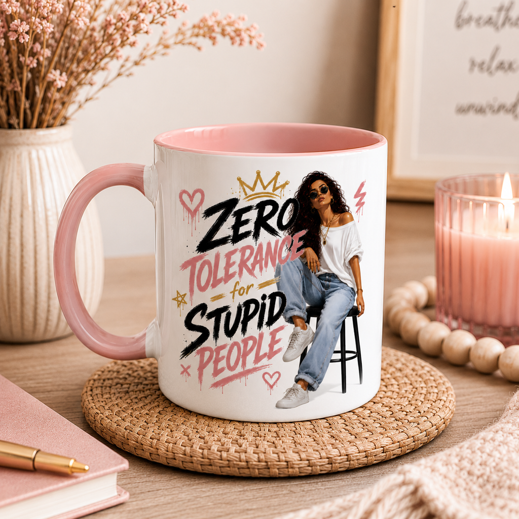 11oz white ceramic mug with blush pink inside and handle featuring "Zero Tolerance For Stupid People" with stylish woman illustration displayed in a soft neutral boho room setting. Funny mug for women and sarcastic coffee mug perfect as a sister gift, best friend gift, birthday gift for her, coffee lover gift and novelty mug for women with attitude and a cheeky sense of humour.