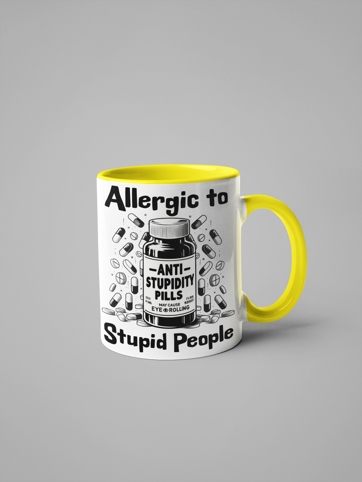 11oz ceramic mug with bright yellow handle and interior, featuring the funny "Allergic to Stupid People" Anti-Stupidity Pills design.