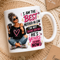 Mug with a design of a woman and text, surrounded by mother in-law decorative elements on a textured surface.