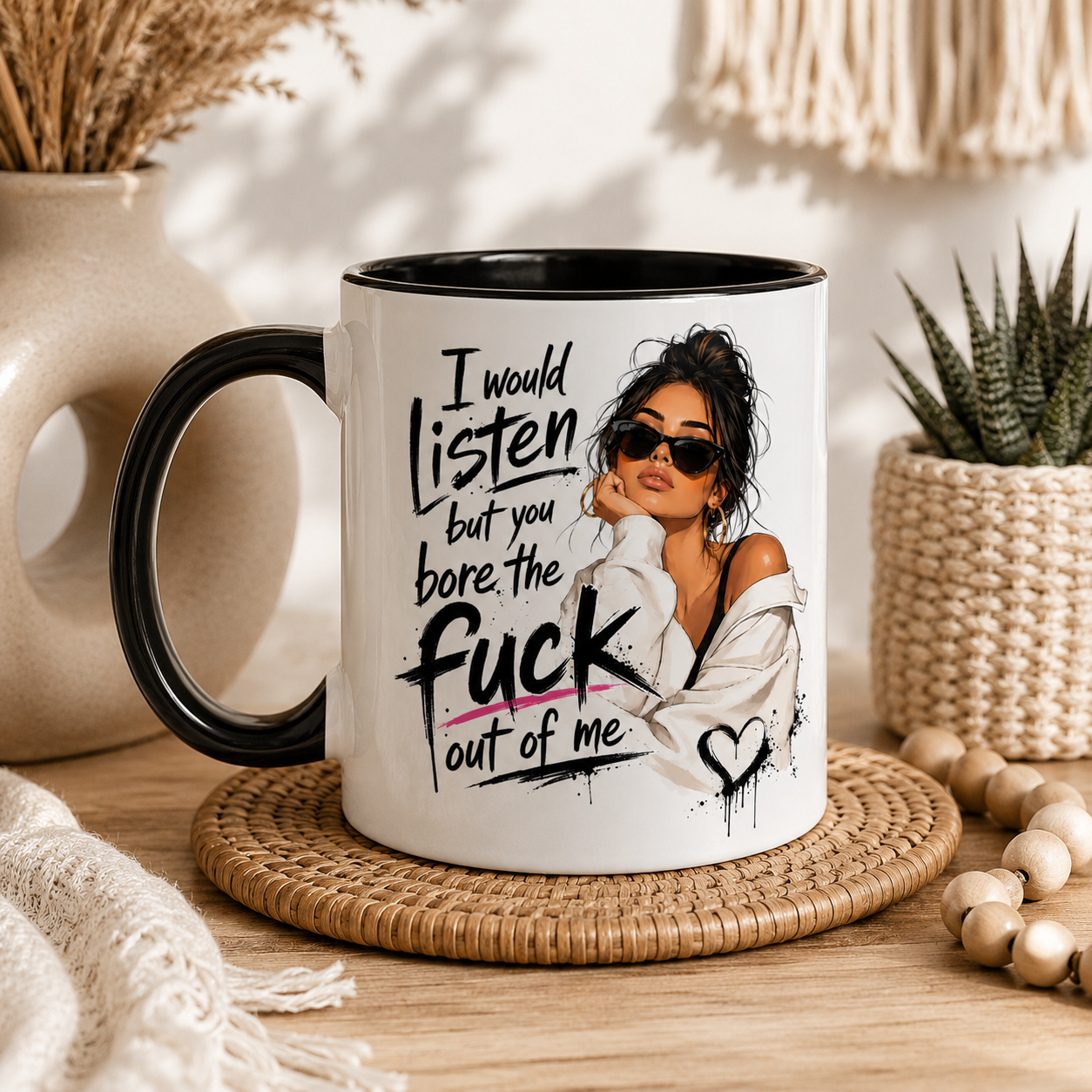 White ceramic mug with black inside and handle featuring the quote “I Would Listen But You Bore The Fuck Out Of Me” and fashionable woman artwork. Styled in a modern boho home setting with warm décor. Funny mug for her, sarcastic coffee mug, novelty gift, rude mug, best friend present, work bestie gift and funny birthday gift for women.