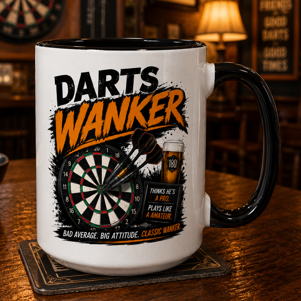 Mug with 'Darts Wanker' design on a bar counter with darts and snacks in the background