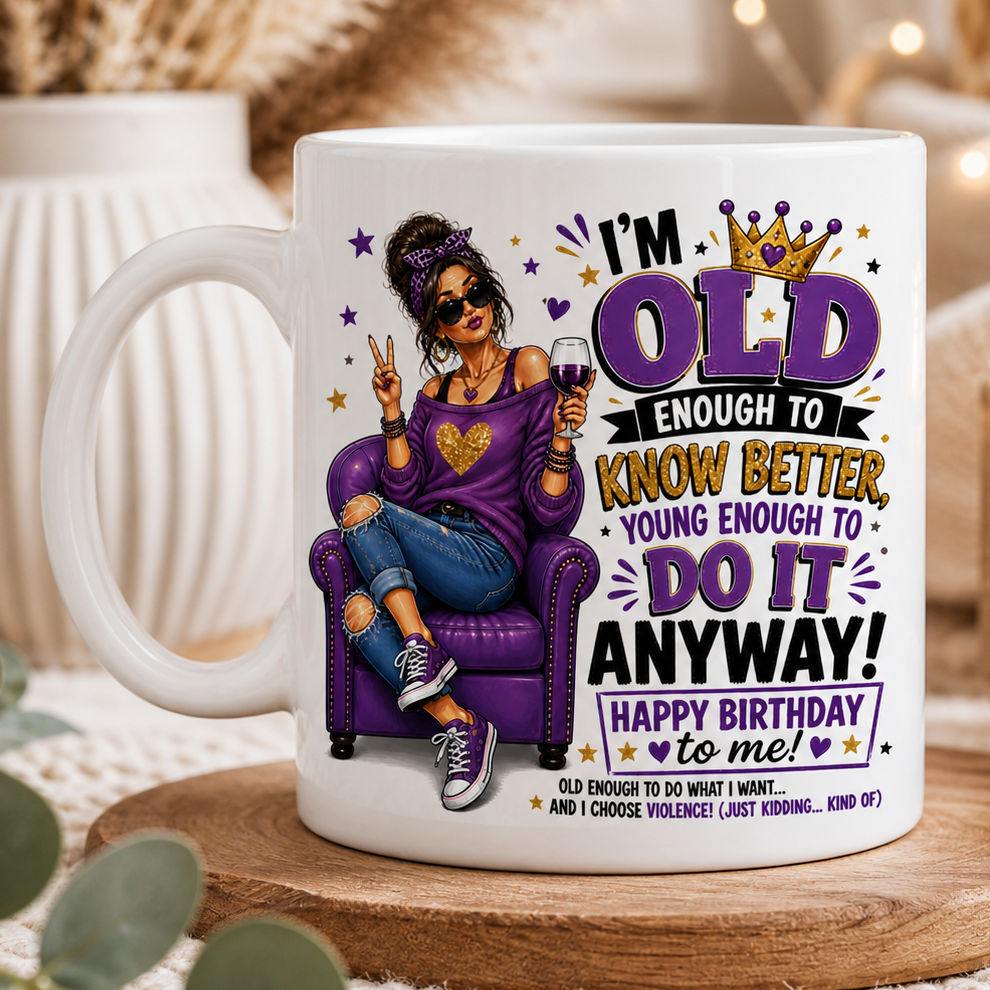 Mug with a design of a woman in a purple chair, text, and a glass of wine on a wooden coaster.