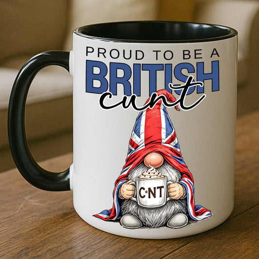 Mug with a British gnome holding a smaller mug, featuring text and the Union Jack, on a wooden surface.