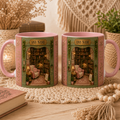 Personalised book lover mug with custom name option featuring a cosy book nook design with bookshelves, soft pink and sage colours, secret garden styling and warm reading corner details. White ceramic mug available with white or pink inside and handle. Personalised reading mug for BookTok fans, bookworms and cosy gift lovers.