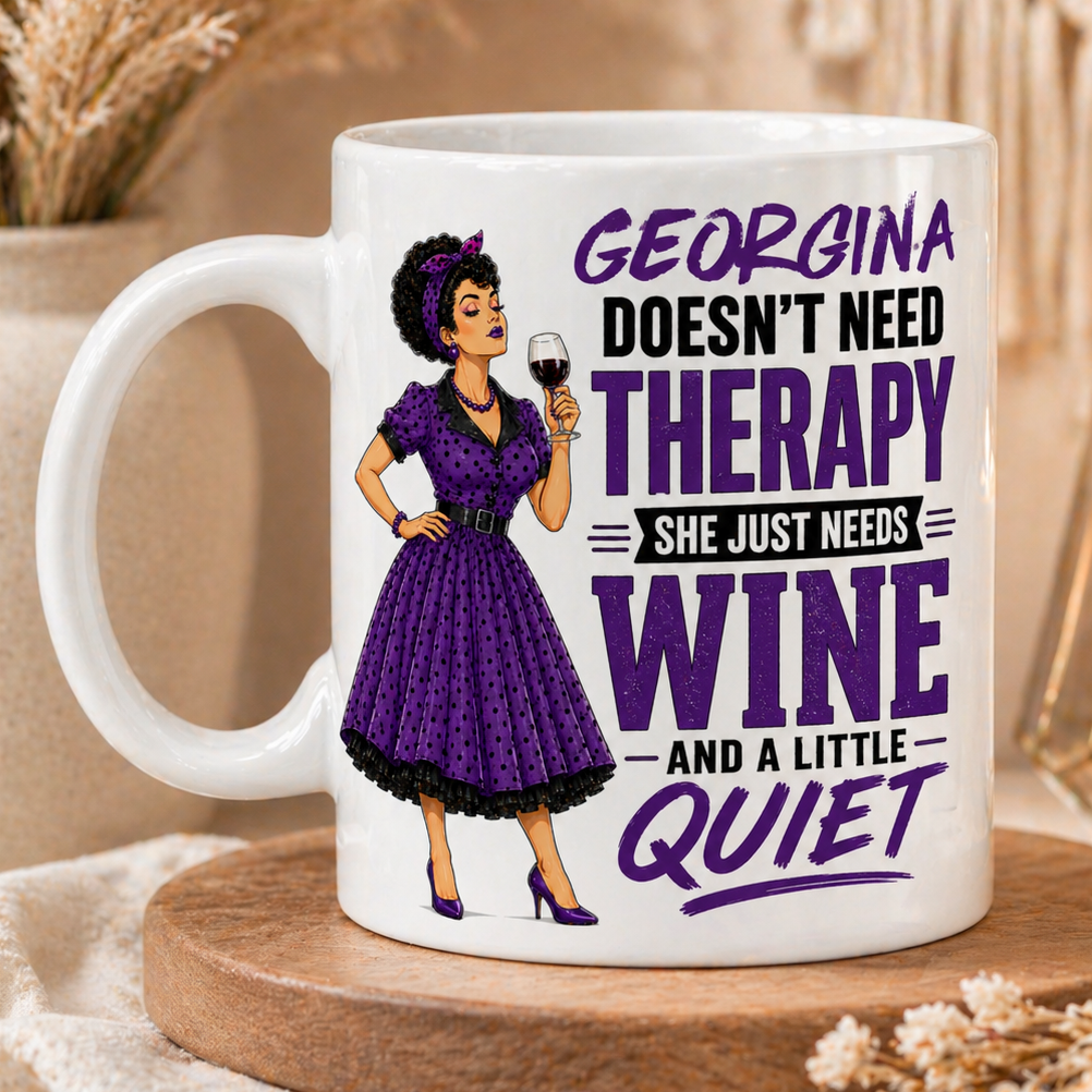 White mug with a graphic of a woman in a purple dress holding a glass of wine, text 'Georgina doesn't need therapy, she just needs wine and a little quiet', on a wooden coaster with decorative elements.