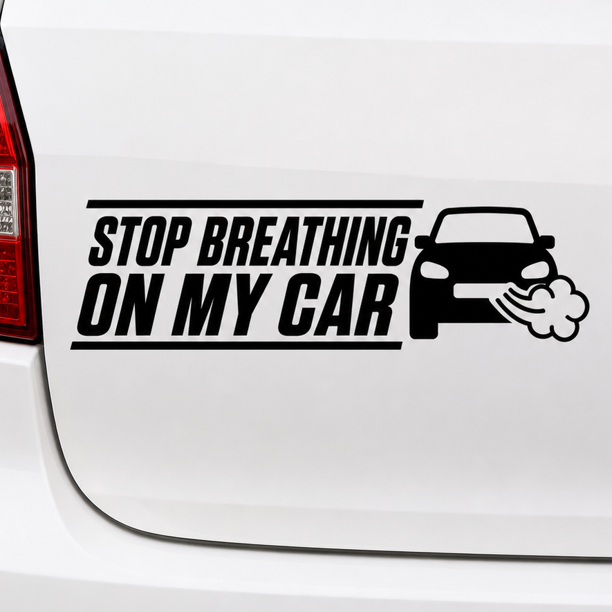 Car sticker with text 'Stop Breathing on My Car' on a white car's rear window.