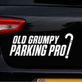 Car with a humorous vinyl decal sticker 'Old Grumpy Parking Pro?' decal on the back