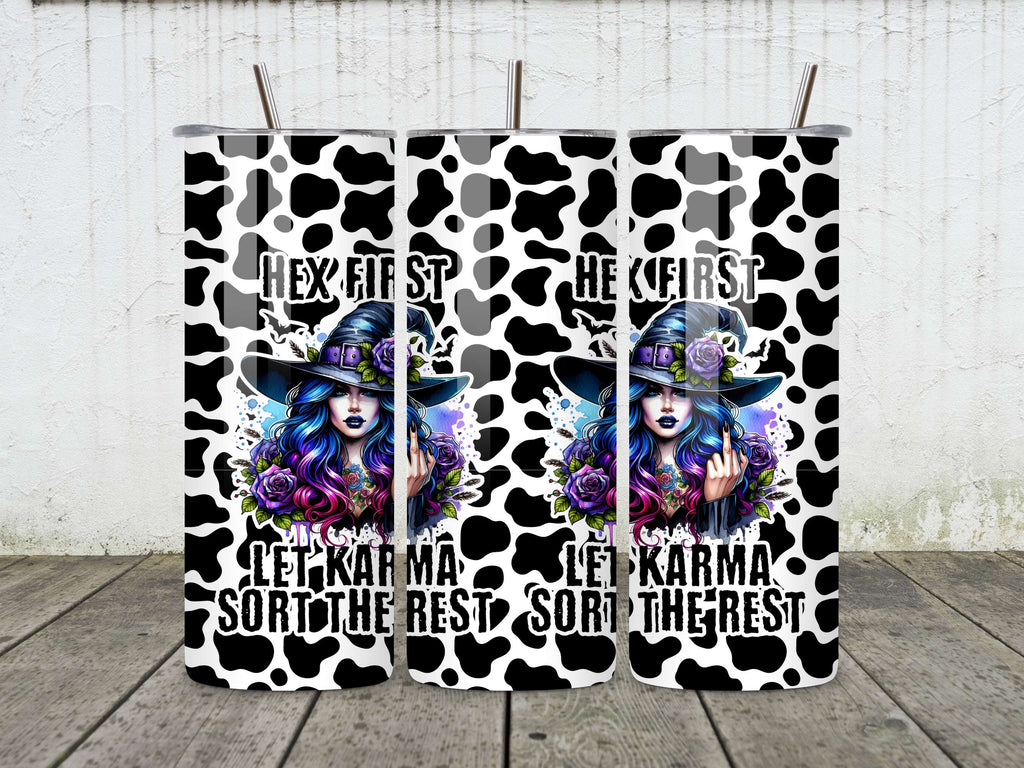20oz stainless steel tumbler with a gothic witch design, showing a mystical blue and purple-haired witch, cow print background, and the phrase "Hex First, Let Karma Sort the Rest." Comes with a spill-proof lid and reusable straws.