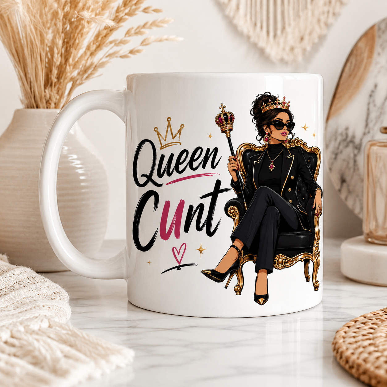 Mug with a graphic of a woman in a chair and the text 'Queen Cunt' on a decorative background.